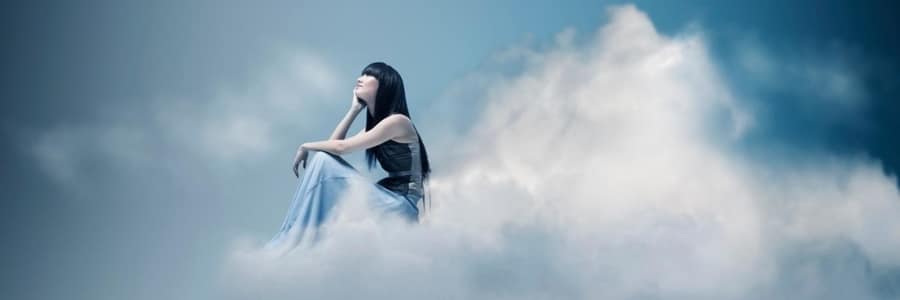 Archangel Gabriel Sitting on top of Clouds Gazing Upward