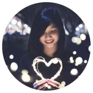 woman holding love heart