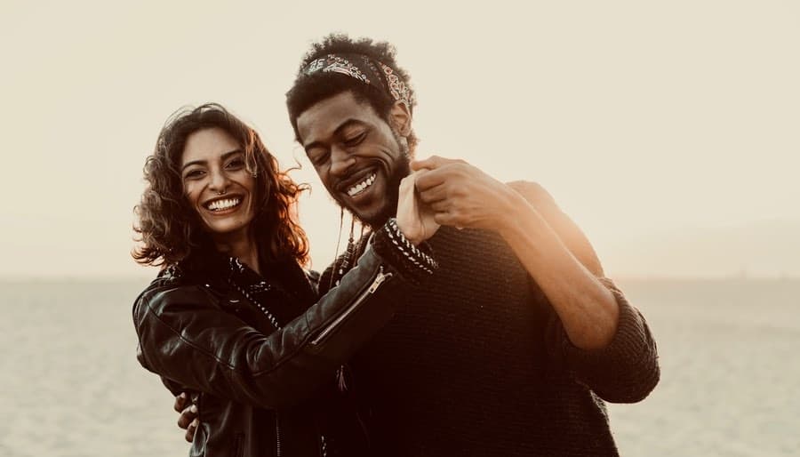 Happy, Laughing Couple wearing Leather Jackets
