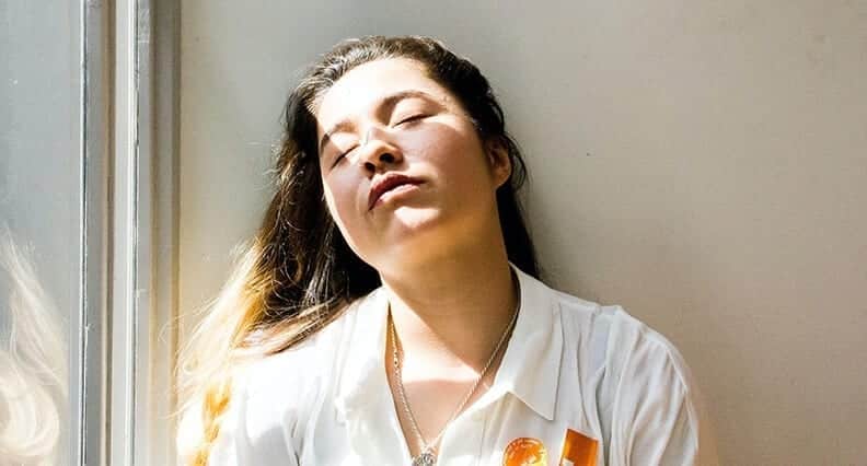 Girl sitting in the sunlight
