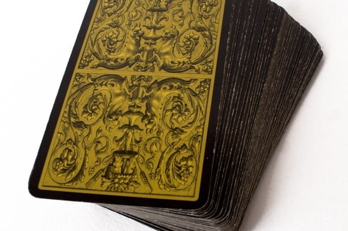 black and gold tarot deck, faced down