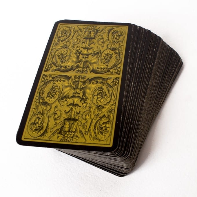 black and gold tarot deck, faced down