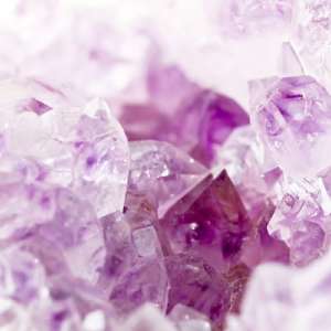 Purple amethyst crystals close-up