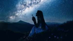Girl Blowing Dandelion Under Milky Way Galaxy Sky