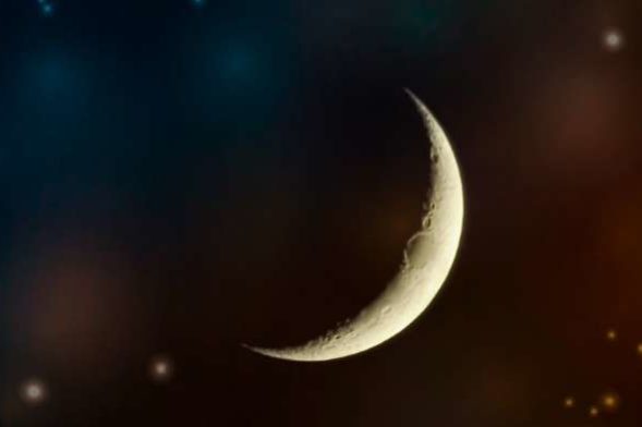crescent moon on warm starry space - new moon abundance activation