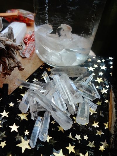 Raw clear quartz crystal points for crystal elixir.