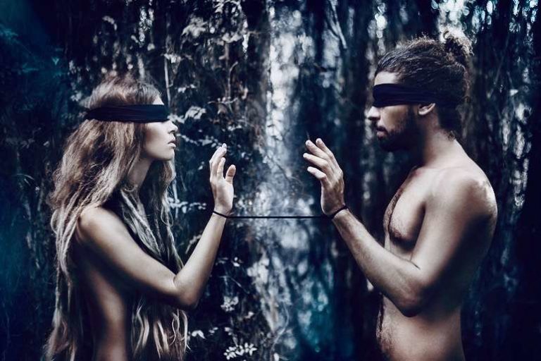Blindfolded Couple in Forest