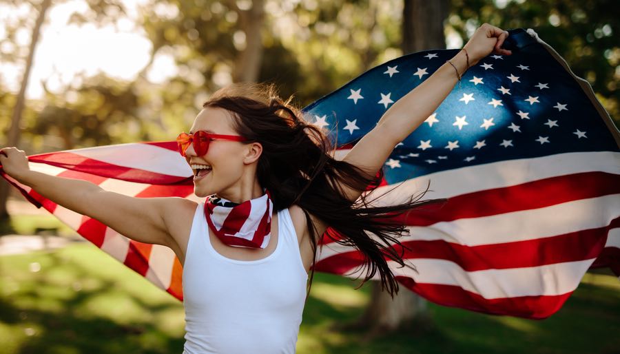 Woman Holding July 4th American Flag