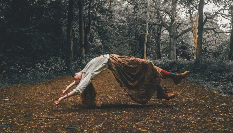 woman dreaming in the forest floating